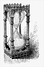 Engraving showing an hourglass
