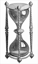 Engraving showing a 16th century hourglass