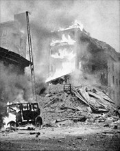 World War II: Finland. Bombing of Helsinki by the Russians.  Block of flats in flames after a direct hit