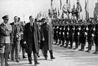Photograph showing Chamberlain, Ribbentrop and Hitler at Munich, 1938