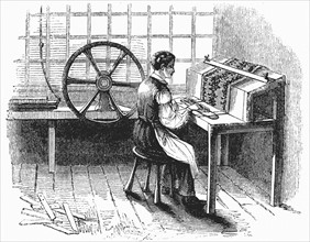 Man operating machine for punching cards for Jacquard looms