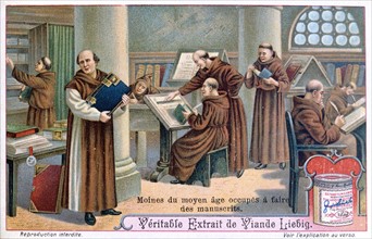 Monks at work on manuscripts in a scriptorium