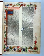 Page of "Bible" printed by Gutenberg, 1456. Illuminated border typical of a manuscript.