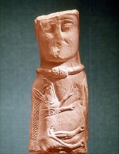 Image of Celtic deity with wild boar and wearing torque