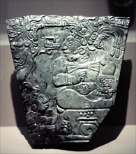 Jade plaque showing Mayan king seated, 400-800
