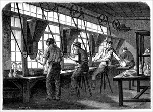 Glass cutters at their wheels