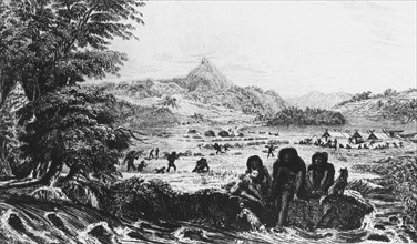 Fuegians at Woollya, with the expedition's camp in the background