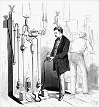 Vacuum apparatus used to exhaust Edison incandescent light bulbs
