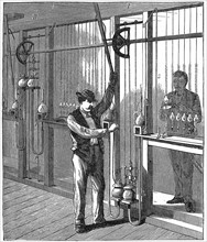 Mercury vacuum pump being used to evacuate light bulbs on commercial scale c1883