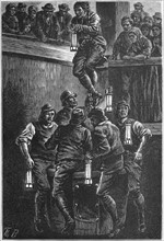 Explorers going down the pit shaft at Seaham Colliery