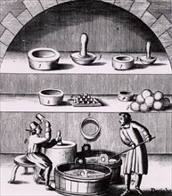 Assaying of silver : man making the cupels