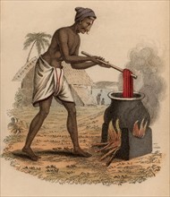 Indien en train de teindre des écheveaux de soie