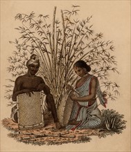 Un tresseur de corbeilles indien et sa femme au travail