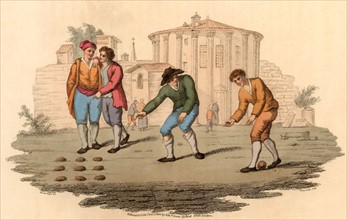 Youths playing Bumble Puppy