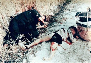 Unidentified Vietnamese man and child killed by US soldiers