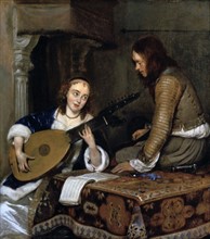 Young woman playing a lute: Dutch interior