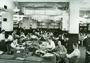 Sub-editors in a newspaper news room