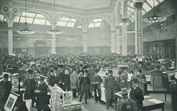 Business in full swing in The Manchester Exchange, headquarters of the grocery trade in Lancashire, England, c1905