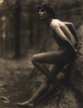 Fred Holland Day, 1864-1933 photographer:Nude youth, with laurel wreath, leaning against rock, exhibited as "Study for Endymion