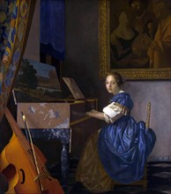 Vermeer, A Young Woman seated at a Virginal