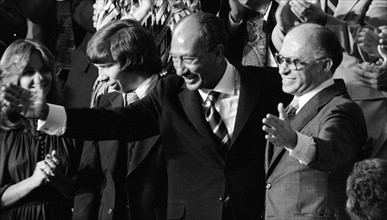 Egyptian President Anwar Sadat and Israeli Prime Minister Menachem Begin acknowledge applause during a Joint Session of Congress in which President Jimmy Carter announced Camp David Accords 1978
