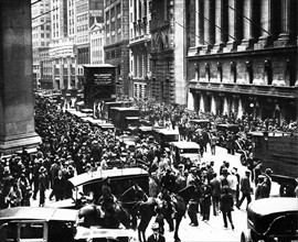 Crowds gather outside the New York Stock Exchange dring the Wall Street Crash in 1929