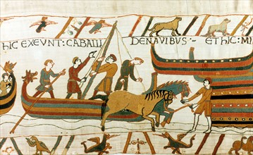 Bayeux Tapestry 1067:  Horses being unloaded from Norman boats at Pevensey, south coast of England, 28 September 1066