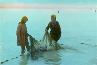 Fishermen hauling in their nets