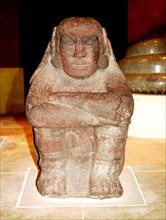 Stone seated figure of Xochipilli