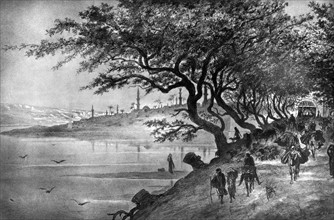Travellers leaving a city via a tree-shaded road