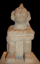 Stone seated figure of Xochipilli