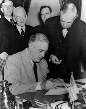 President Franklin Roosevelt signing the United states declaration of war