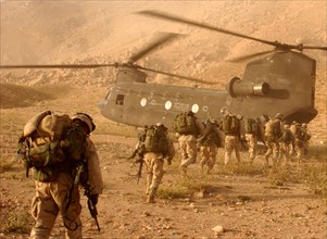 Soldiers board a Chinook helicopter in the invasion of Afghanistan 2001