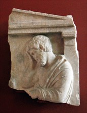 Grave relief depicting a man in sorrow