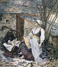 Young mother sitting in the corner of a garden