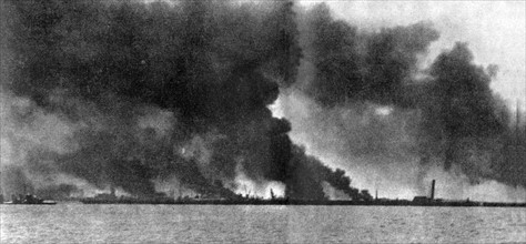 Dunkirk in flames from German bombardment