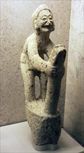 Limestone figure of an old man and boy Huaxtec