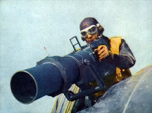A naval cameraman in a SN-J naval training plane