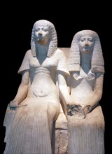 Limestone statue of a husband and wife