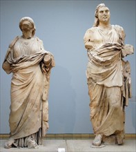 Colossal statue of a man and woman