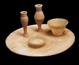 Calcite table and vessels