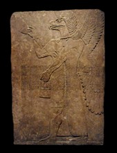 Assyrian winged genie figure