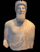 Colossal limestone statue of a bearded man