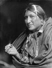 Native North American Indian smoking cigarette