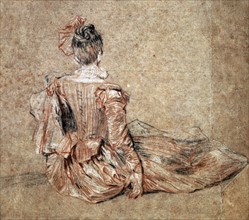 Seated woman viewed from the back