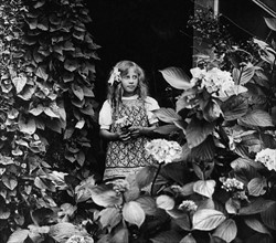 French girl in a garden