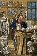 Sculptor carving a stone statue