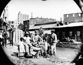 African-American a family in a city in the American south some years after the Civil War.