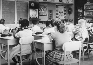 Television delivering lessons to pupils, c1967