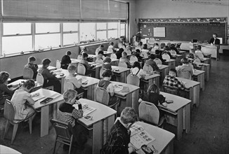 lesson in a racially segregated class of white American school children. Circa 1967